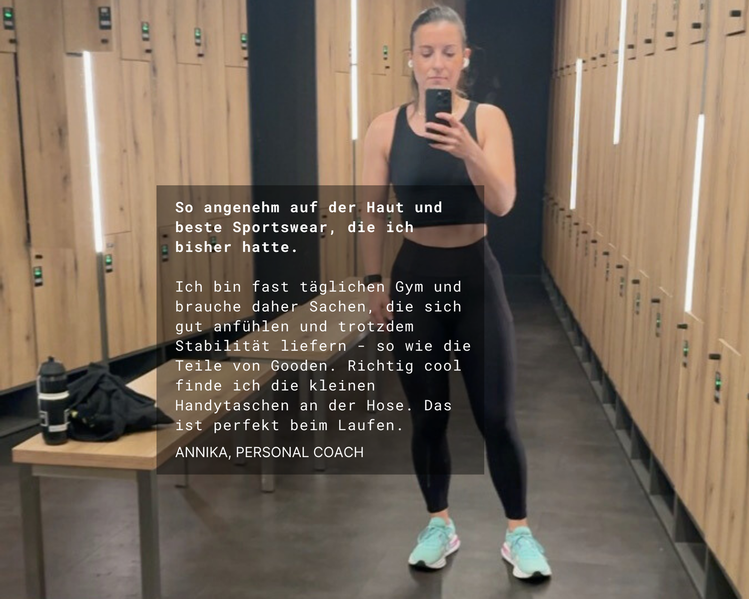 Personal Coach Annika im Gym trägt schwarze Sport Leggings und Crop Top von GOODEN Sportswear – nachhaltige Sportswear Damen mit praktischer Handytasche, perfekt für Training und Laufen