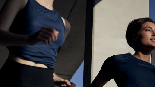 Women running in GOODEN Sportswear clothes.
