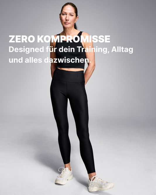 Frau in schwarzer GOODEN Leggings, pflanzenbasiert, langlebig, funktional, fair produziert.
